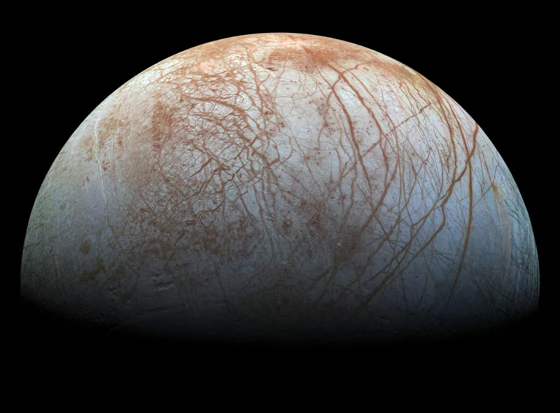 Europa is a moon of Jupiter. It entices scientists to explore a huge ocean beneath an icy surface. Image credit NASAJPL-CaltechSETI Institute.